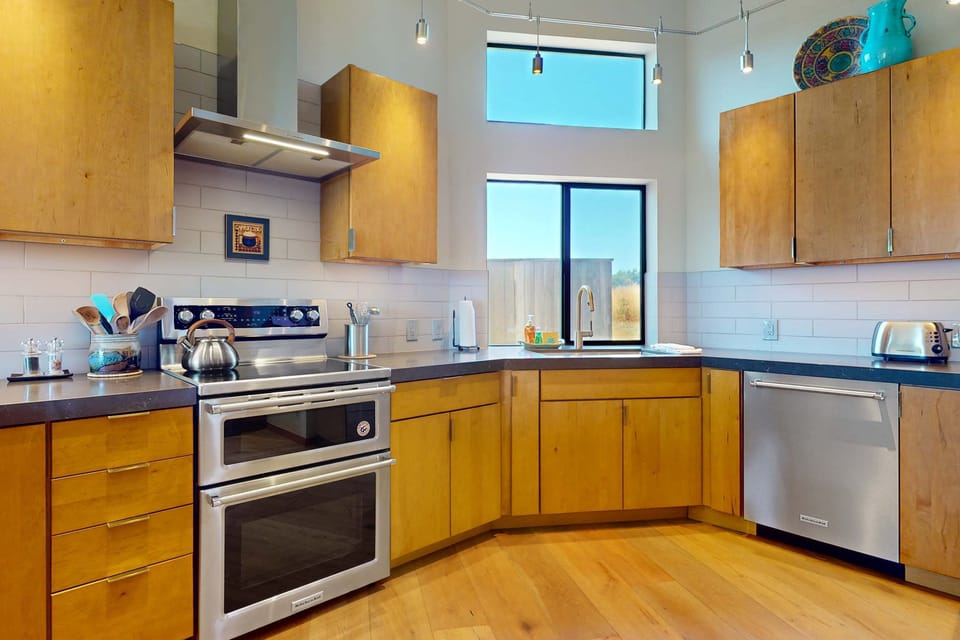 This well-equipped kitchen invites you to whip up fresh meals, with easy access to the dining area for seamless entertaining.