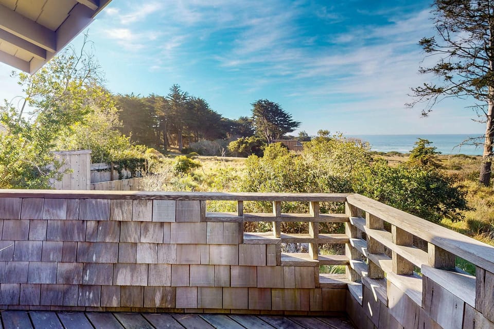 Breathe in the coastal air from the deck, where you can unwind and soak in the scenery of the lush landscape and ocean beyond.