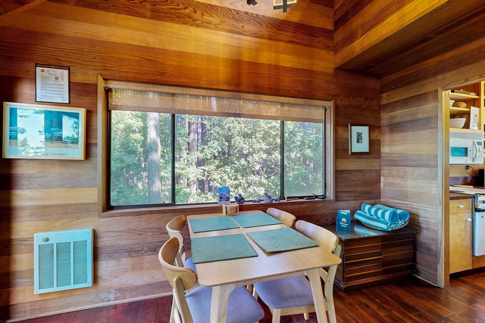 This charming dining nook offers a peaceful spot to enjoy breakfast while soaking in the surrounding greenery.