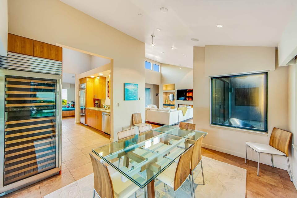This contemporary dining area connects seamlessly to the living spaces, making it perfect for entertaining or family dinners.
