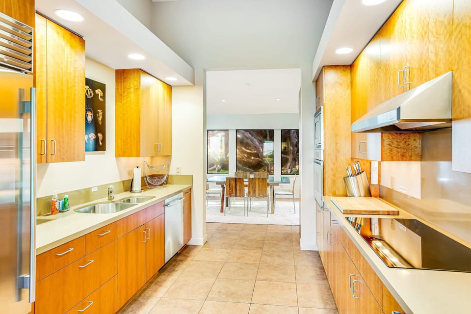 Unleash your culinary creativity in this well-equipped kitchen, where modern appliances and ample counter space make cooking a delight.