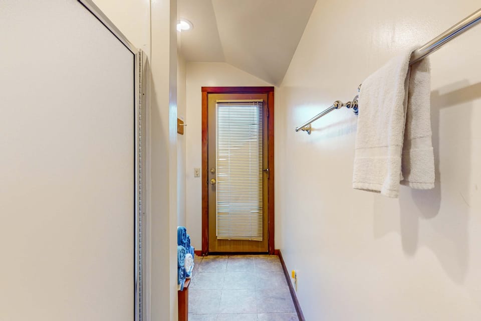 Refresh in this bright bathroom, featuring modern amenities and a calming atmosphere to start your day with ease.