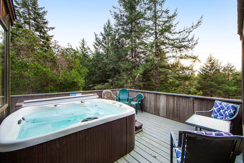Soak under the stars in your private hot tub, surrounded by the serene sounds of nature, perfect for unwinding after a day of adventure.