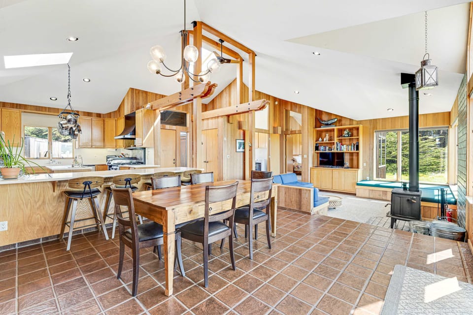 Cook up a feast in a well-equipped kitchen, where culinary creativity meets coastal charm, inviting family gatherings.