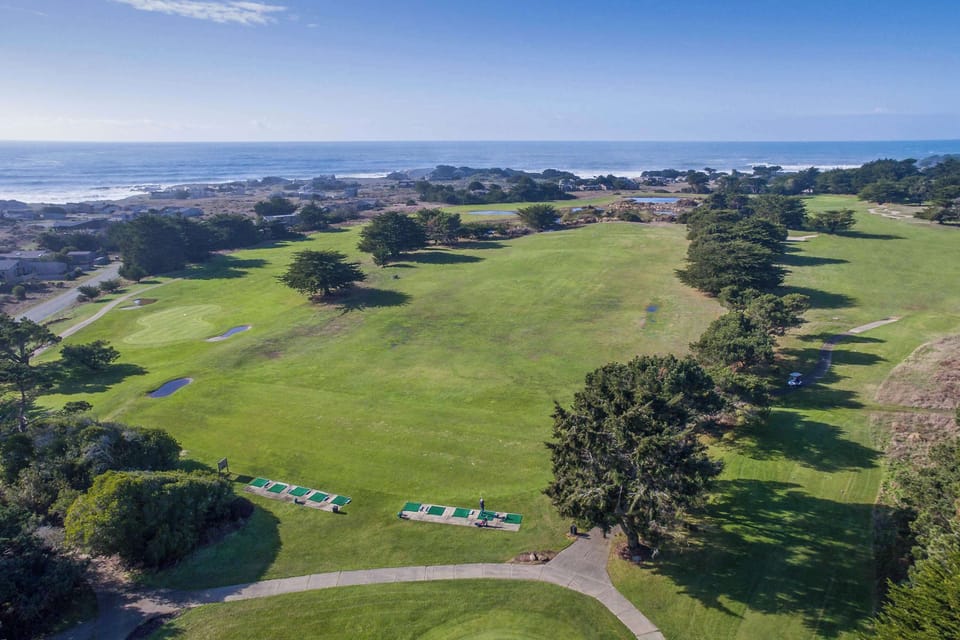 Marvel at the expansive views of the golf course and beyond, where ocean waves meet rolling greens for a scenic escape.