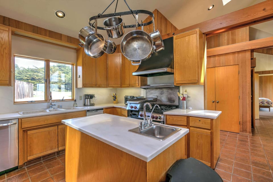 This functional kitchen combines style and convenience, making meal prep a breeze for your beachside getaway.