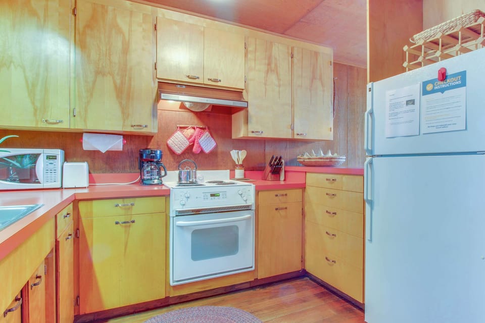 This well-equipped kitchen invites you to whip up delicious meals, with easy access to the dining area for effortless entertaining.