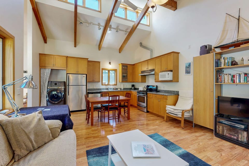 Cook your favorite meals in the spacious kitchen, fully equipped for culinary creations while enjoying the company of friends.