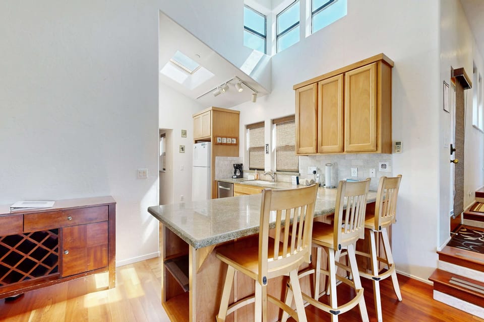 Craft your culinary masterpieces in this well-appointed kitchen, where modern amenities and plenty of space await your creativity.