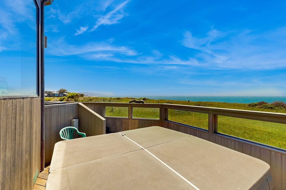 Picture yourself unwinding in the hot tub, gazing at the horizon as the sun sets over the Pacific.