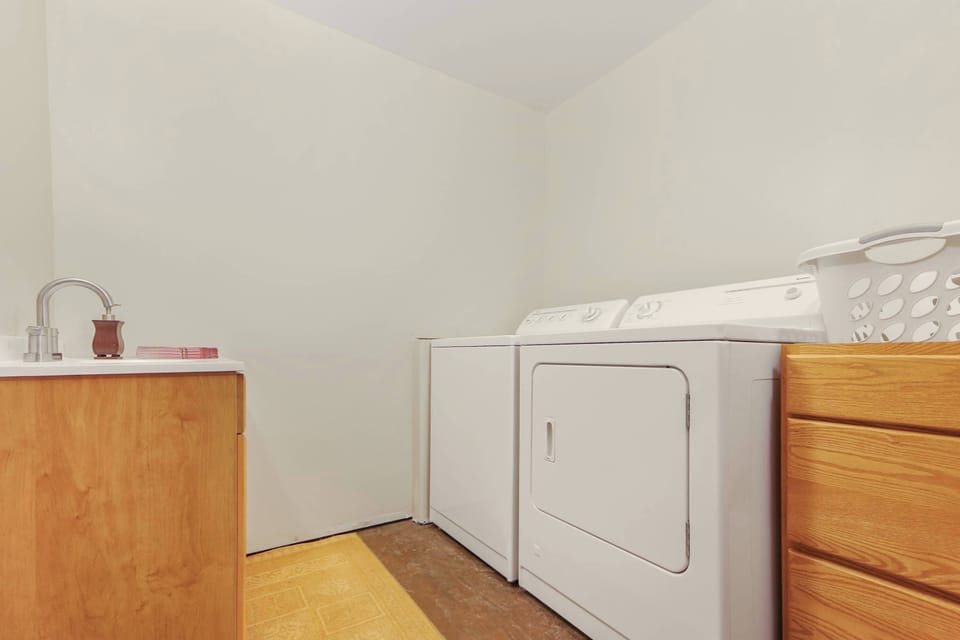 Convenience meets functionality in this laundry area, ensuring you have everything you need for a stress-free stay at Meadow House.