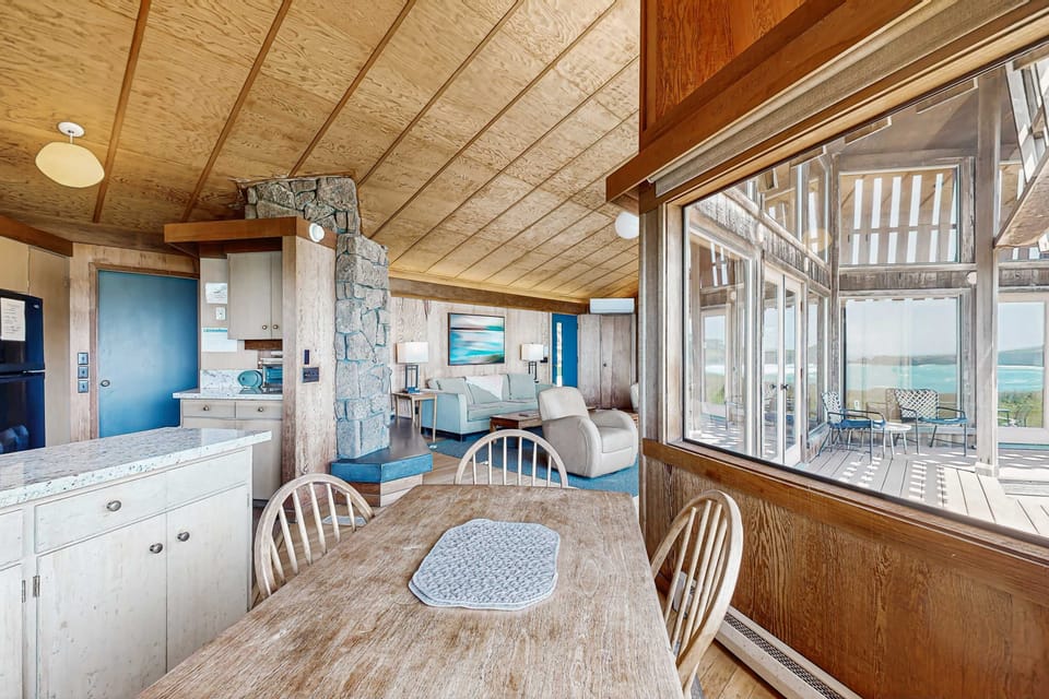 Gather around for unforgettable meals, as natural light floods the dining area, creating a warm, inviting atmosphere.