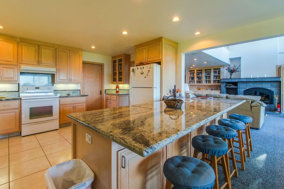 The well-equipped kitchen invites culinary adventures, whether you're whipping up a quick breakfast or a festive dinner.