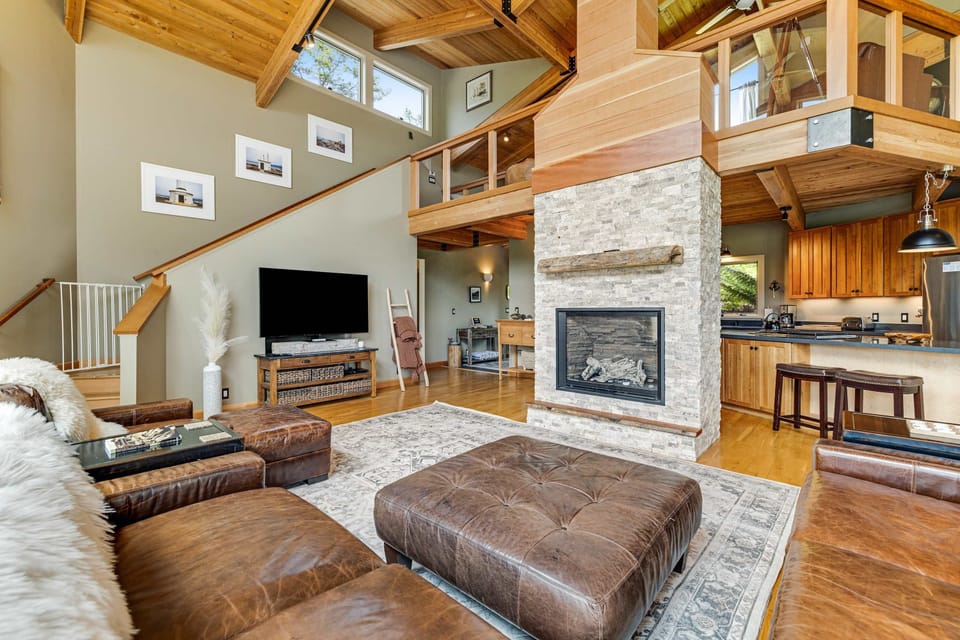 Experience warmth and comfort by the gas fireplace in this inviting living room, ideal for cozy evenings.