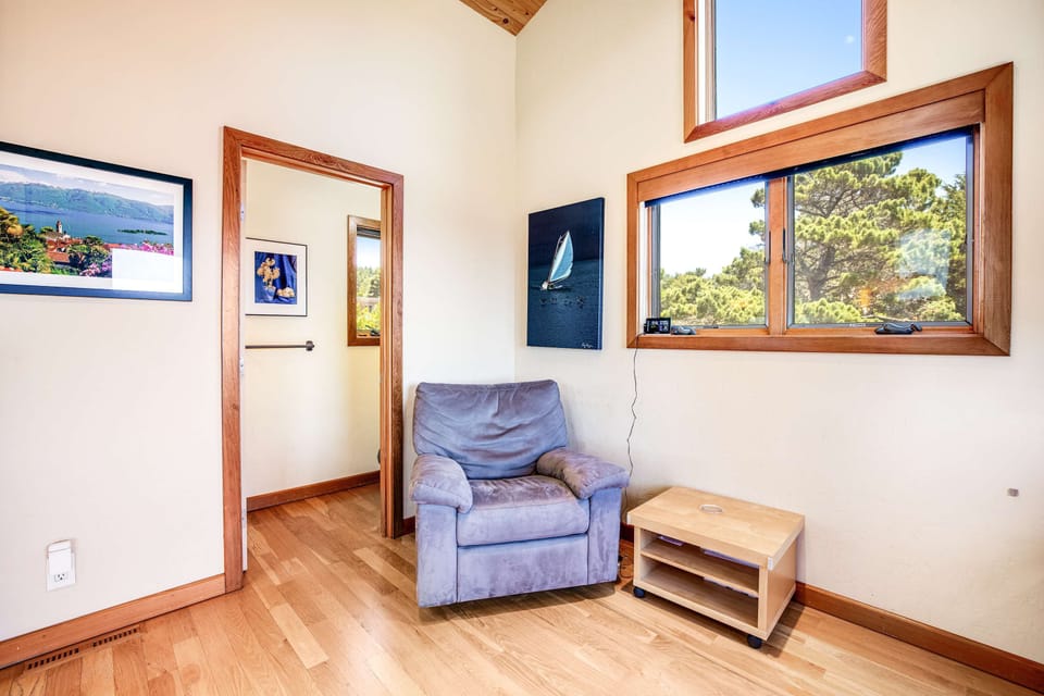 This cozy corner is the perfect retreat for a good book or quiet moments, with natural light streaming in to enhance your relaxation.