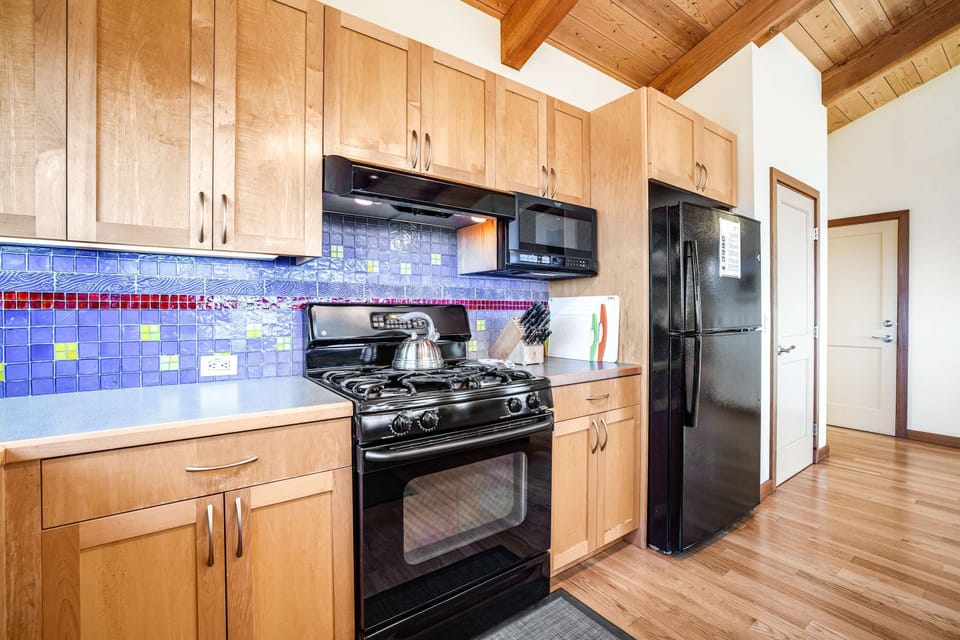 Modern appliances and ample space in this kitchen make meal prep enjoyable, whether you're brewing morning coffee or preparing dinner.