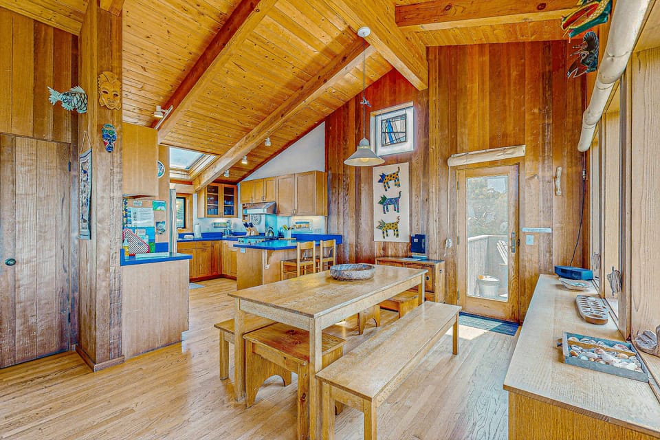 Connect around the rustic dining table, where every meal becomes a cherished memory against the backdrop of beautiful views.
