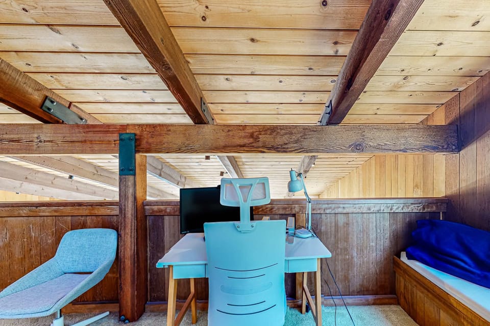 Create your ideal workspace in this cozy loft area, designed for productivity while soaking in the serene coastal atmosphere.