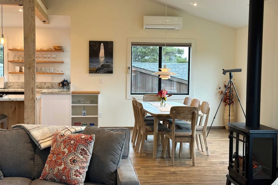 Enjoy meals and conversations in the inviting dining area, where warmth and charm create lasting memories.