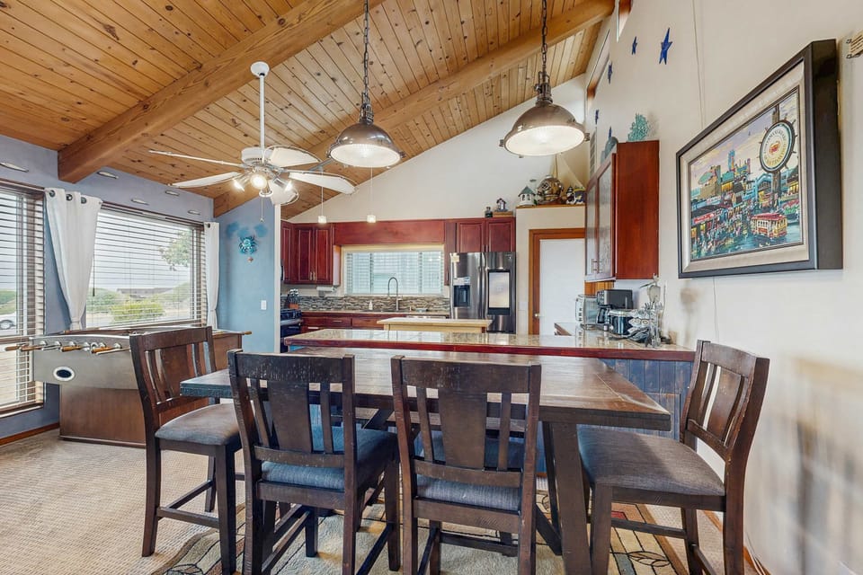 Cook up your favorite meals in this stylish kitchen, designed for convenience and comfort, with ample space to gather and share culinary delights.