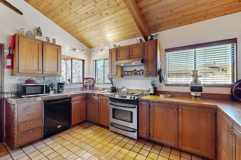 Cook up coastal-inspired meals in the well-equipped kitchen, where culinary adventures become cherished memories.