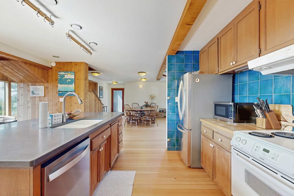 Unleash your inner chef at the spacious kitchen island, perfect for casual breakfasts or gathering with loved ones while you cook.