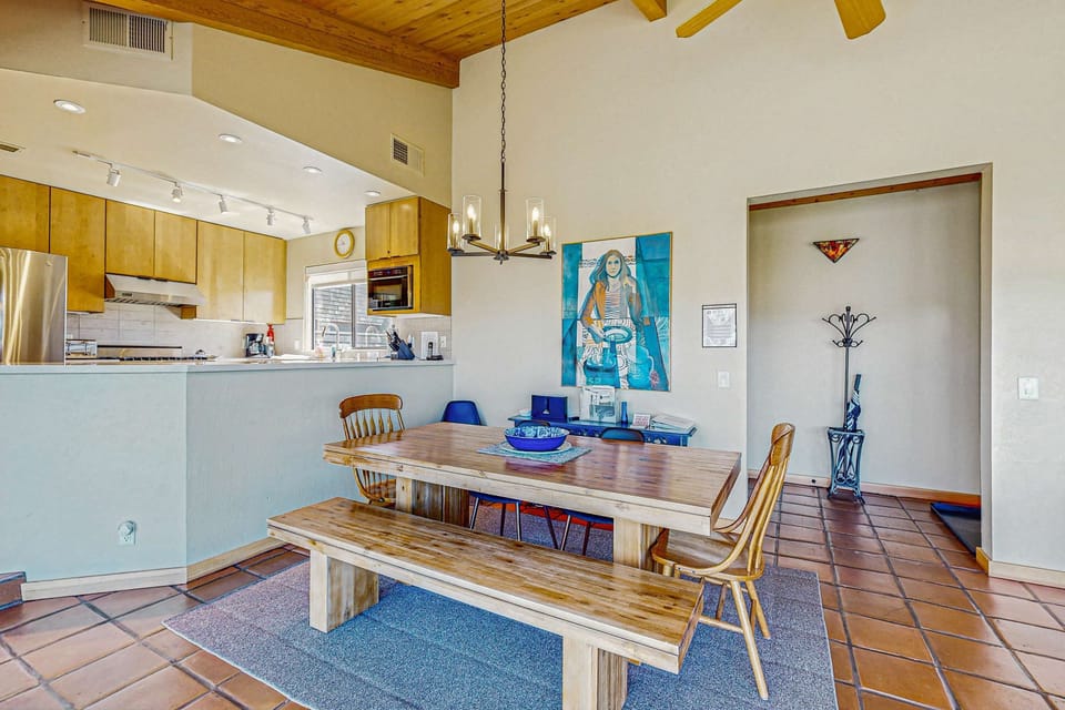 Dine in style at this spacious table, where every meal can be a celebration, enhanced by the warm ambiance of Sea Ranch.