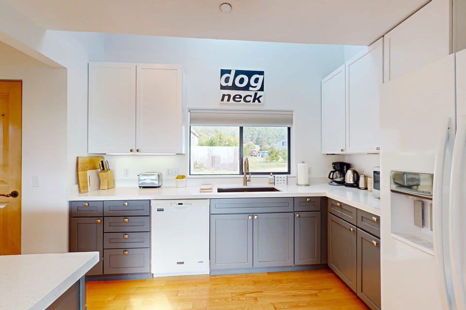 Your culinary adventures await in this modern kitchen, equipped for everything from quick breakfasts to gourmet dinners, all while enjoying ocean views.