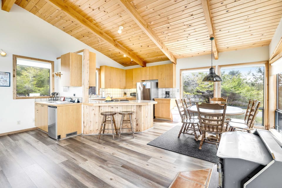 Gather around the island for a casual breakfast before your coastal adventures, where the layout encourages connection and conversation.