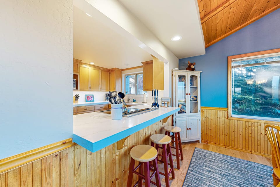 The well-equipped kitchen invites you to whip up your favorite meals, with a convenient breakfast bar for casual bites and drinks.