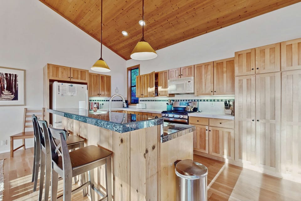 Craft culinary delights in a spacious kitchen, where modern appliances and ample counter space inspire your inner chef.