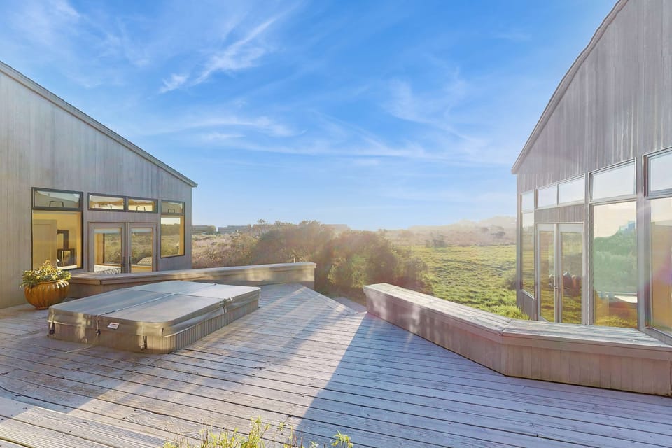 Embrace sunset moments on the expansive deck, where you can unwind while taking in the tranquil beauty of Sea Ranch.