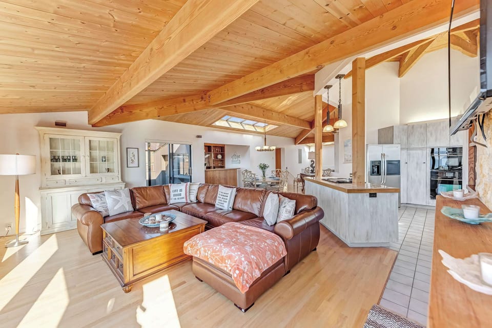 Spacious and inviting, this living room is perfect for family gatherings or quiet evenings, all while enjoying the coastal scenery.