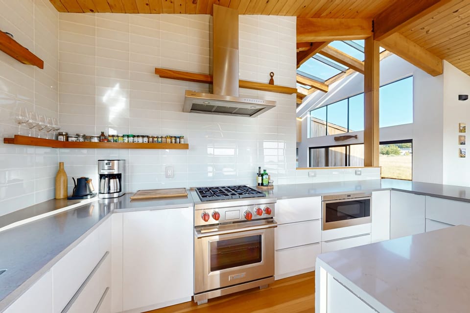 Cook with ease in this stylish kitchen, designed for both functionality and inspiration, with ample counter space and natural light.