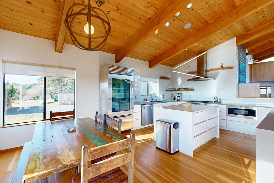 This modern kitchen features sleek finishes and an open layout, making it easy to prepare meals while enjoying the view.