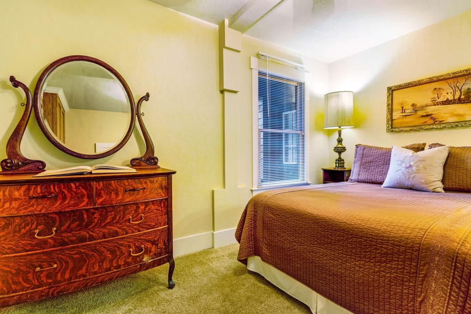 A charming dresser complements the tranquil ambiance in the master bedroom, inviting you to relax and recharge.