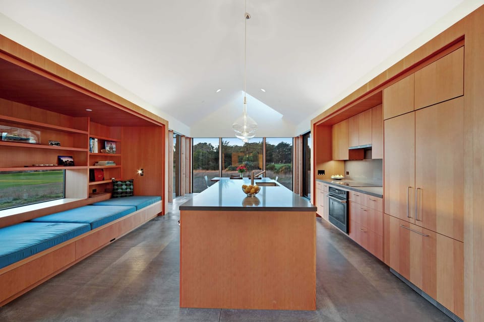 Craft culinary delights in this sleek kitchen, where modern design meets functionality, making meal prep an enjoyable experience.