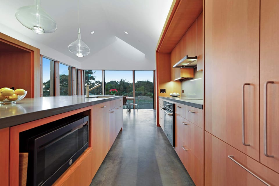 Cook with ease in this well-appointed kitchen, where sleek design meets functionality, inviting you to create delicious memories.
