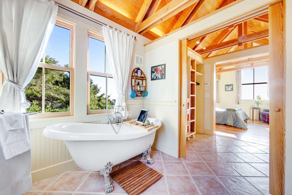 Unwind in style with the luxurious clawfoot tub, perfectly positioned to let you soak in the beauty of your surroundings.