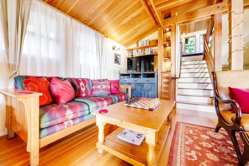 Feel at home on the vibrant couch, where you can unwind after a day of exploring the scenic beauty of Gualala.