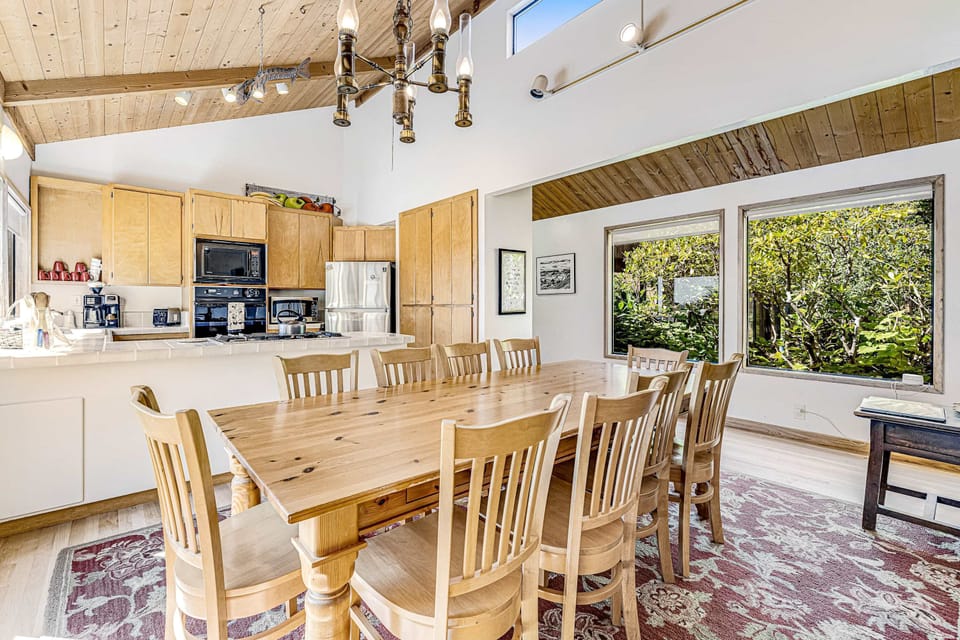 Share meals and laughter at the dining table, surrounded by nature’s beauty just outside the windows.