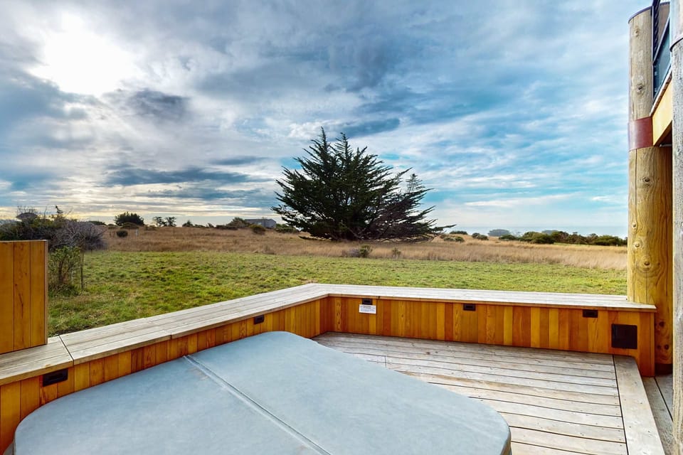 Soak under the stars in your private hot tub, where relaxation and ocean breeze create the ultimate unwind experience.