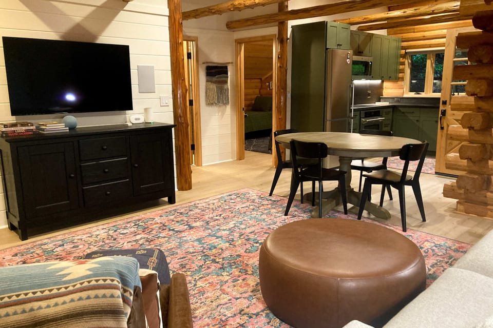 Enjoy modern comforts in this stylish living space, seamlessly blending rustic charm with contemporary amenities.
