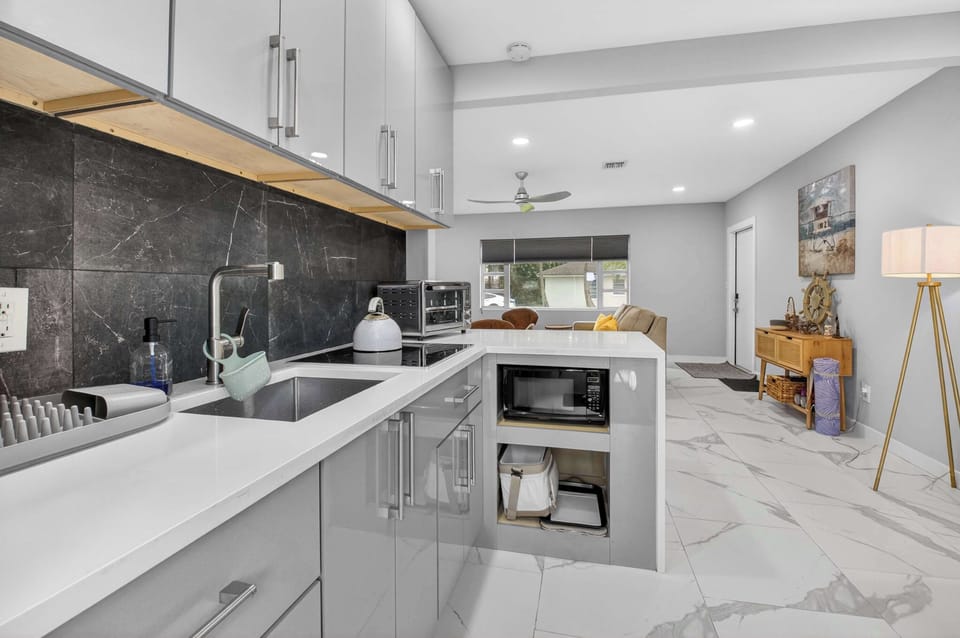 The airy kitchen offers ample space & all the comforts of home​