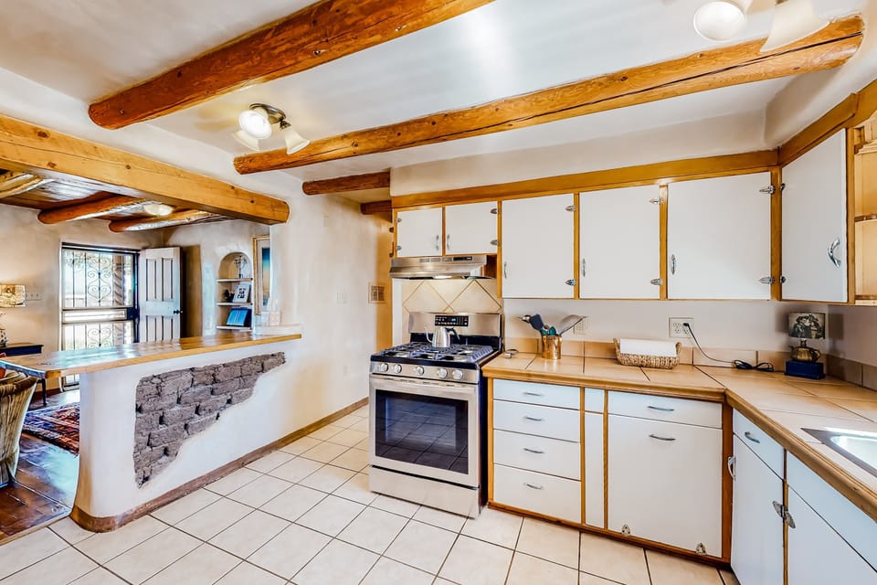 Tile counters and an open, light-filled layout