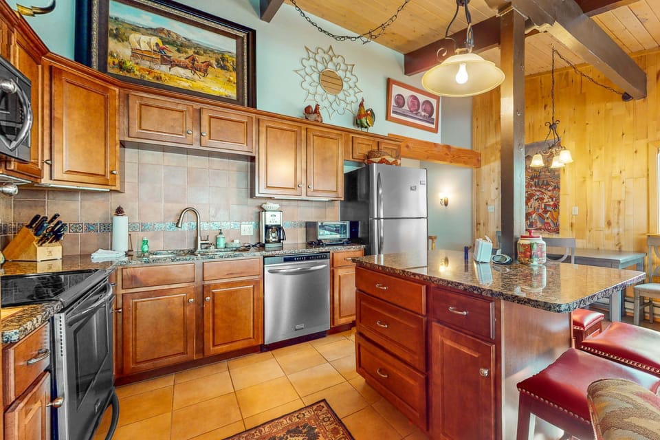 Pull up a stool at the granite island while meals come together