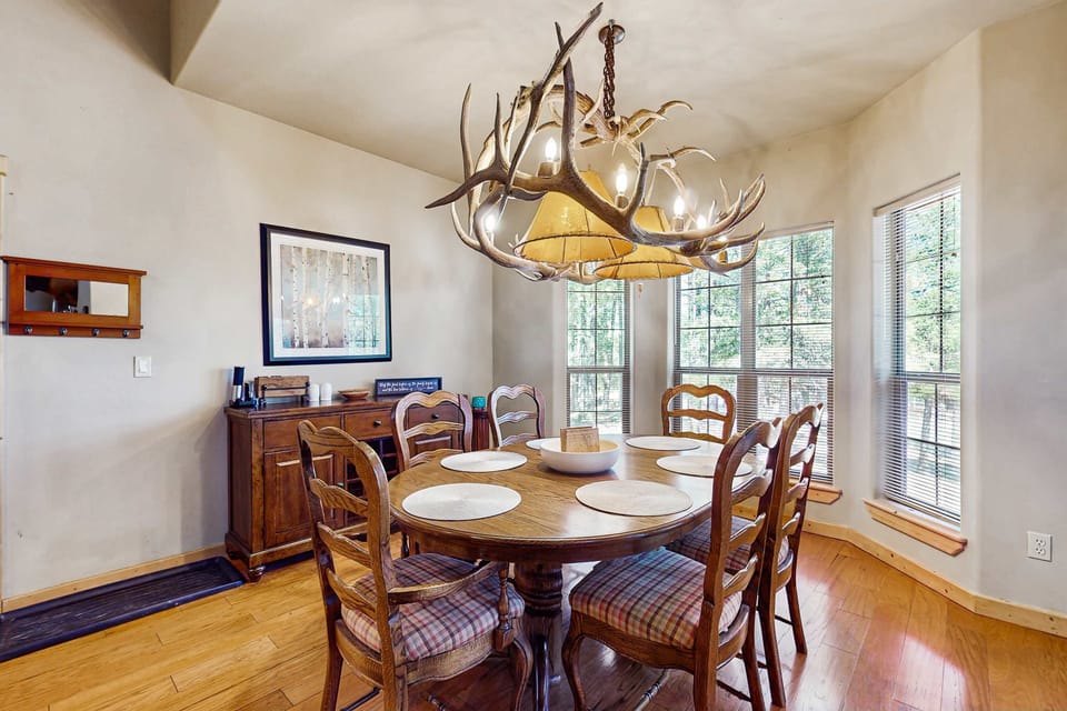 Linger over dinner beneath the antler chandelier