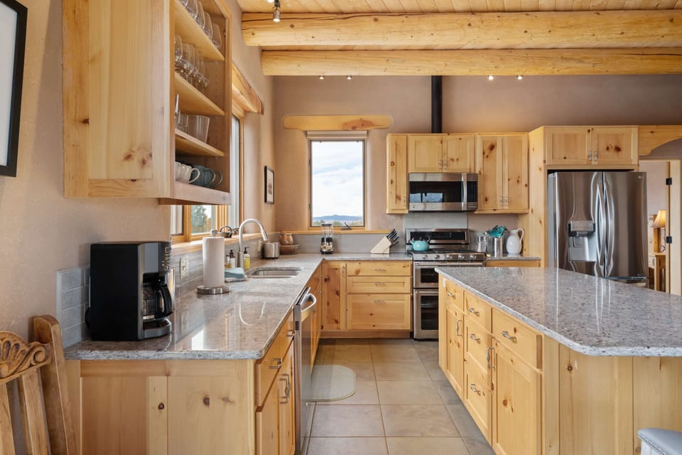 Cook a feast in the gourmet kitchen with granite counters and gas range