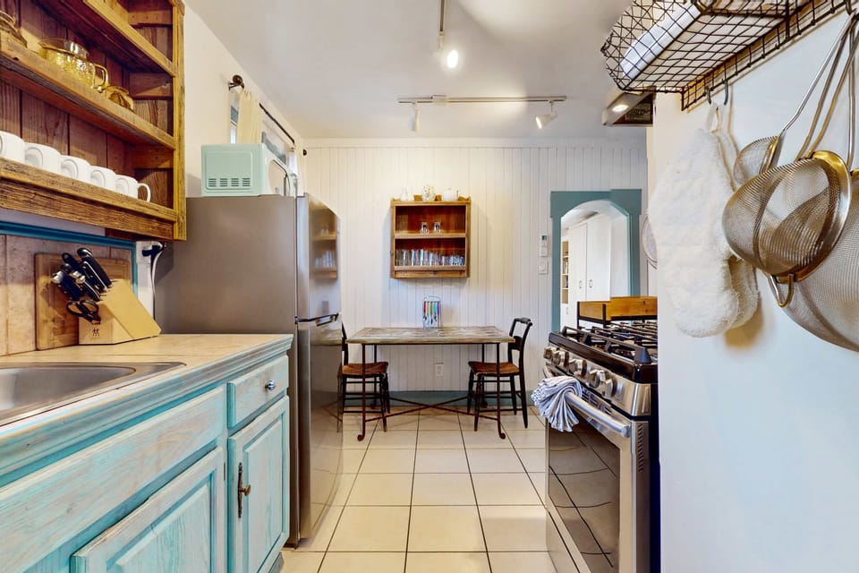 Whip up meals with full appliances and a sunny breakfast nook