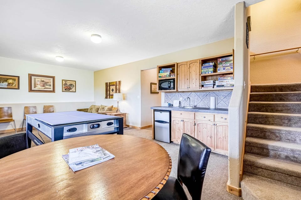 Relax and play in the spacious lower-level game room